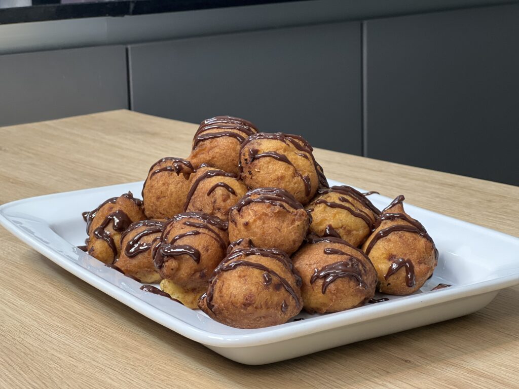 Bunelos Aga, Chamorro Donuts, drizzled with chocolate ganache